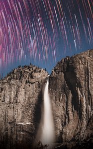 Preview wallpaper rock, cliff, waterfall, starry sky, long exposure, stone