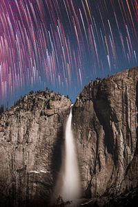 Preview wallpaper rock, cliff, waterfall, starry sky, long exposure, stone