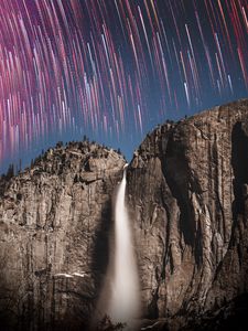 Preview wallpaper rock, cliff, waterfall, starry sky, long exposure, stone