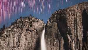 Preview wallpaper rock, cliff, waterfall, starry sky, long exposure, stone