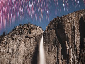 Preview wallpaper rock, cliff, waterfall, starry sky, long exposure, stone