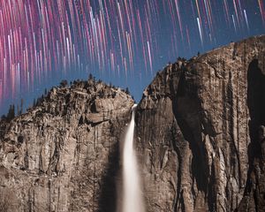 Preview wallpaper rock, cliff, waterfall, starry sky, long exposure, stone