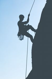 Preview wallpaper rock climber, mountains, rock, silhouette