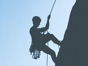 Preview wallpaper rock climber, mountains, rock, silhouette