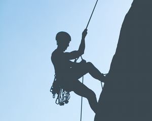 Preview wallpaper rock climber, mountains, rock, silhouette