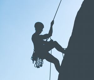 Preview wallpaper rock climber, mountains, rock, silhouette