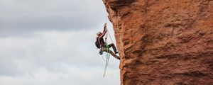 Preview wallpaper rock climber, rock, peak, extreme, sky
