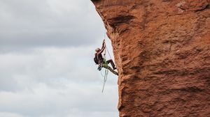 Preview wallpaper rock climber, rock, peak, extreme, sky