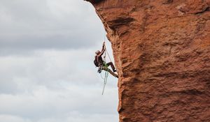 Preview wallpaper rock climber, rock, peak, extreme, sky