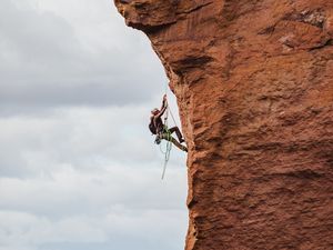 Preview wallpaper rock climber, rock, peak, extreme, sky