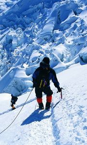 Preview wallpaper rock climber, snow, mountains, top, conquest