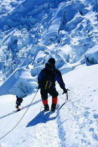 Preview wallpaper rock climber, snow, mountains, top, conquest