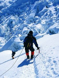 Preview wallpaper rock climber, snow, mountains, top, conquest