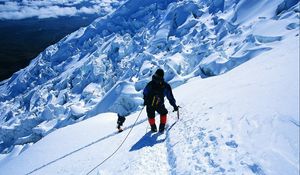 Preview wallpaper rock climber, snow, mountains, top, conquest