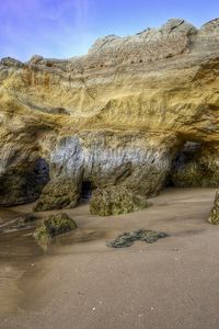 Preview wallpaper rock, coast, sand, outflow, dampness