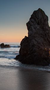 Preview wallpaper rock, coast, sea, waves, twilight, landscape