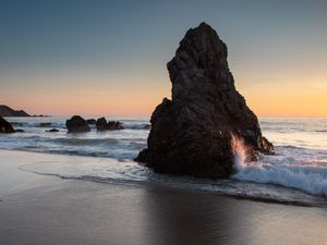 Preview wallpaper rock, coast, sea, waves, twilight, landscape