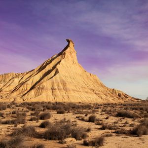 Preview wallpaper rock, desert, vegetation, rock formations, bardenas reales, spain