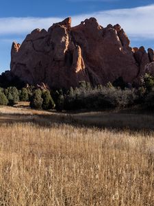 Preview wallpaper rock, field, grass, landscape, nature