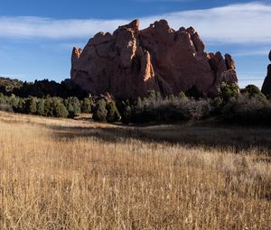 Preview wallpaper rock, field, grass, landscape, nature