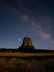 Preview wallpaper rock, field, starry sky, stars, night