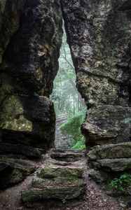 Preview wallpaper rock, gorge, path, fog, nature