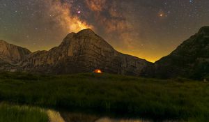 Preview wallpaper rock, grass, pond, milky way, night