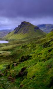 Preview wallpaper rock, hills, grass, landscape