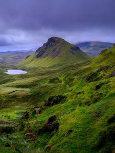 Preview wallpaper rock, hills, grass, landscape