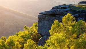 Preview wallpaper rock, hills, trees, rocks