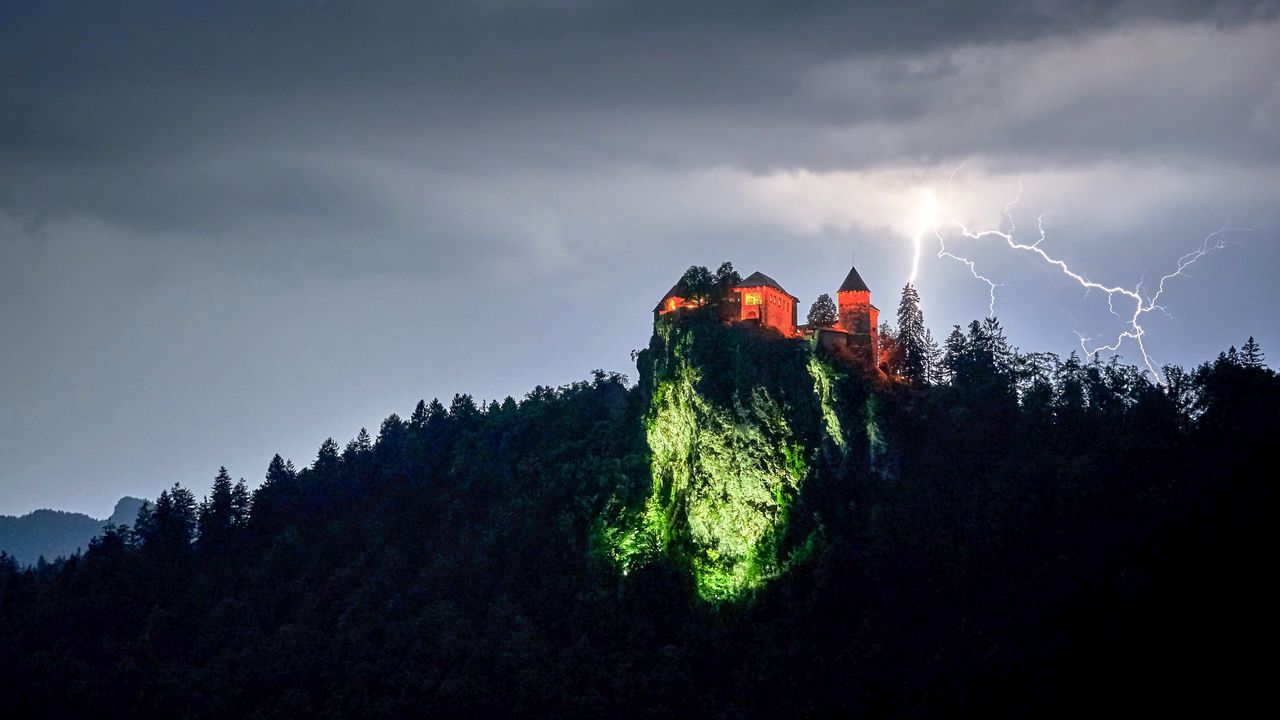 Wallpaper rock, house, light, lightning, twilight