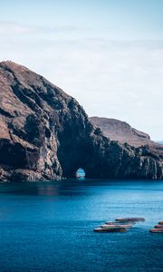 Preview wallpaper rock, island, sea, boats, water