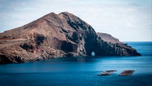 Preview wallpaper rock, island, sea, boats, water