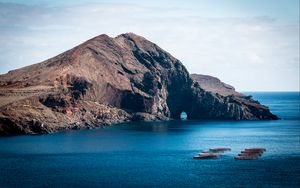 Preview wallpaper rock, island, sea, boats, water