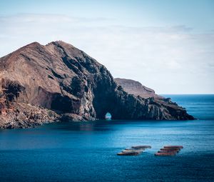 Preview wallpaper rock, island, sea, boats, water