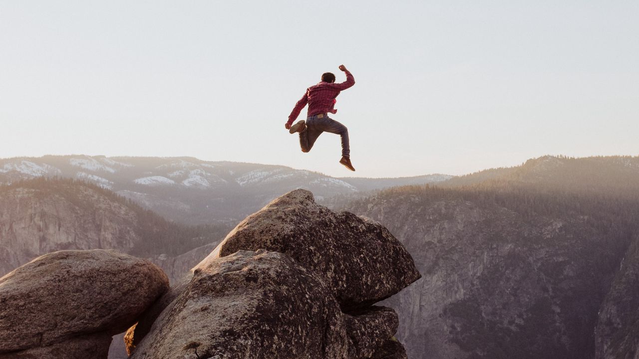 Wallpaper rock, jump, freedom, mountains, stones, man