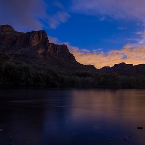 Preview wallpaper rock, lake, evening, nature, landscape