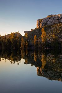 Preview wallpaper rock, lake, trees, reflection, nature