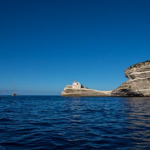 Preview wallpaper rock, lighthouse, sea, nature