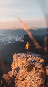 Preview wallpaper rock, man, alone, mountains, peak