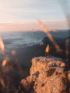 Preview wallpaper rock, man, alone, mountains, peak