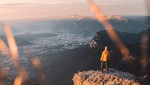 Preview wallpaper rock, man, alone, mountains, peak