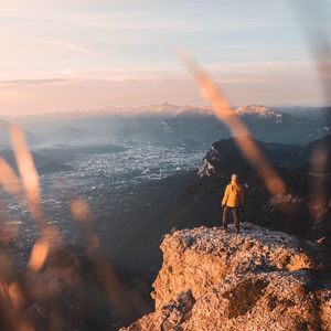 Preview wallpaper rock, man, alone, mountains, peak