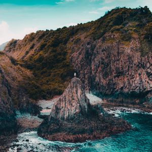 Preview wallpaper rock, man, alone, sea, coast, nature