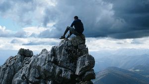 Preview wallpaper rock, man, precipice, mountains, height, freedom