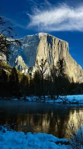 Preview wallpaper rock, mountain, lake, snow, trees