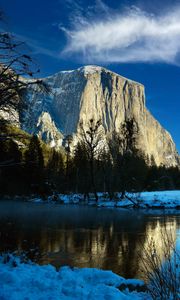 Preview wallpaper rock, mountain, lake, snow, trees