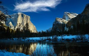 Preview wallpaper rock, mountain, lake, snow, trees