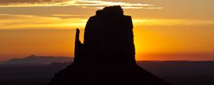 Preview wallpaper rock, mountain, silhouette, sunset