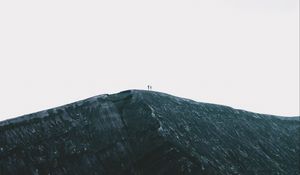 Preview wallpaper rock, mountain, silhouettes, top, sky, minimalism